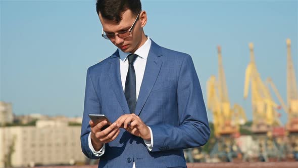 Businessman Working On Smart Phone