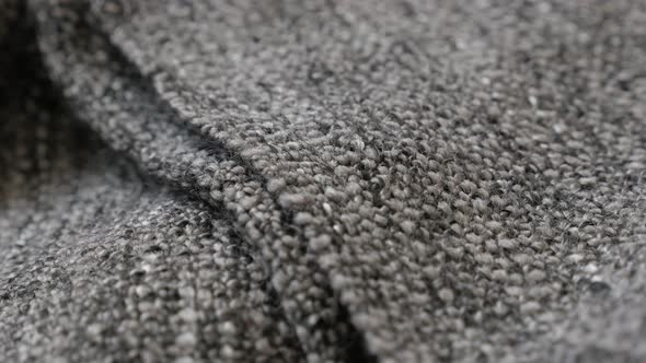 Folded warm blanket made of yarn 4K panning footage