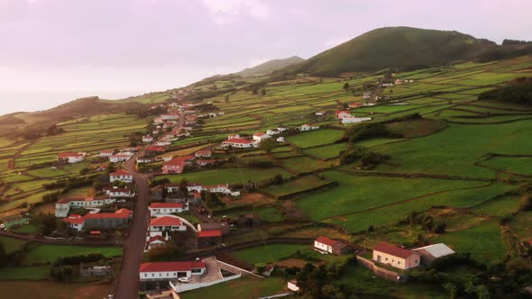 Village Houses and Farm Buildings Covered Hills of Mountains at Sao Jorge Island alt