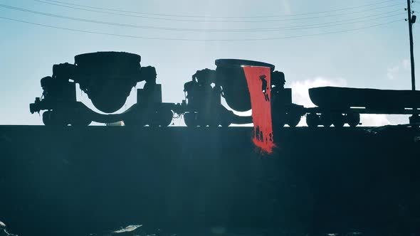 Melted Metal is Getting Discharged From the Factory Pots alt