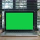 Chroma key green screen laptop computer set up for work on home office - VideoHive Item for Sale