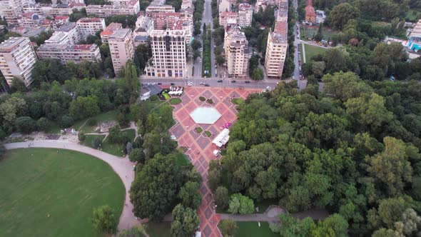 Aerial View in  Quality at Urban Park with Meadow Trees and Paths
