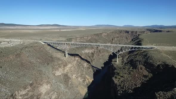 Drone video of the Rio Grande Gorge Suspension Bridge Colorado New Mexico Taos Snow alt