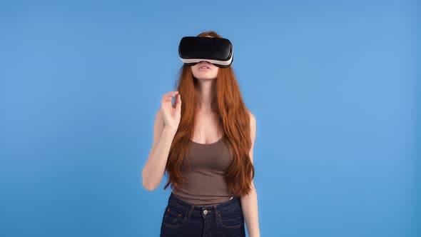 Redheaded Female in VR Headset Brown Shirt and Jeans alt