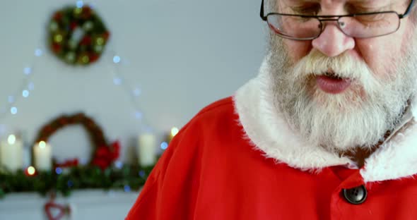 Santa claus holding sack 4k alt