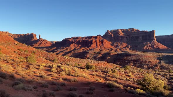 Driving past the rock formations of the Valley of the Gods alt