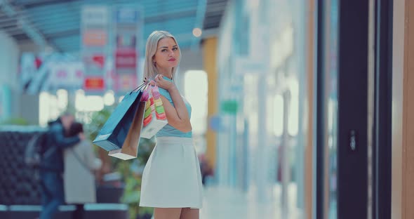 Beautiful Girl in Shopping Center alt