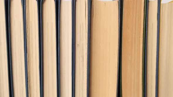 bookshelf with various books alt