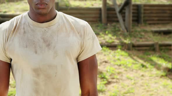 Fit men standing at boot camp alt