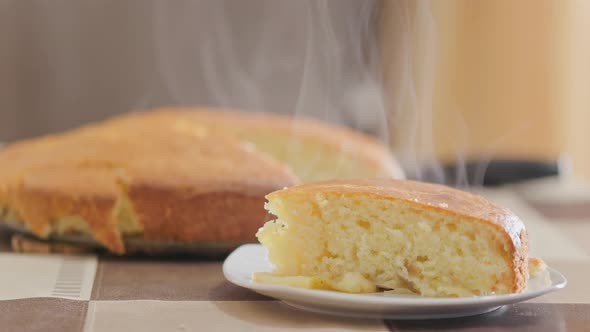 Vapor Rising From Slice of Fresh Baked Domestic Pie alt