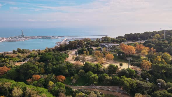 Aerial drone view of Barcelona city sea coastline with port. Sunny day. Montjuic district. Spain alt