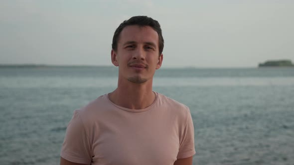 One Casual Portrait Adult Man Smiling and Enjoying on Sky Background  Closeup