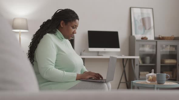 African-American Businesswoman Working from Home alt