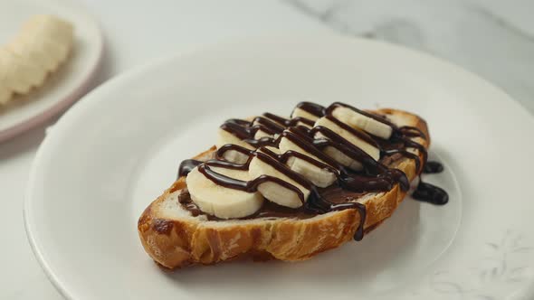 Croissant with chocolate and berries