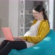 Relaxed Caucasian Pregnant Woman Messaging Online on Laptop Smiling Sitting on Bag Chair at Home - VideoHive Item for Sale