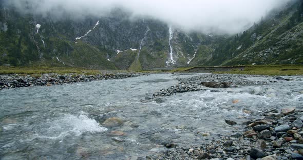 Mountain River and Sulzenau Waterfall in Fog in Background alt