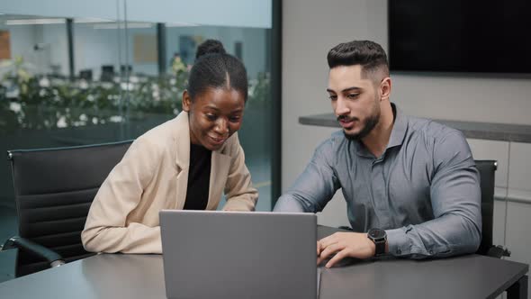 Multiethnic Business Partners Gave Success with Laptop Online Project in Office alt