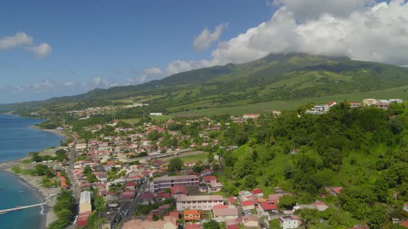 Aerial of green landscape and settlement along Caribbean Coast, Saint-Pierre alt