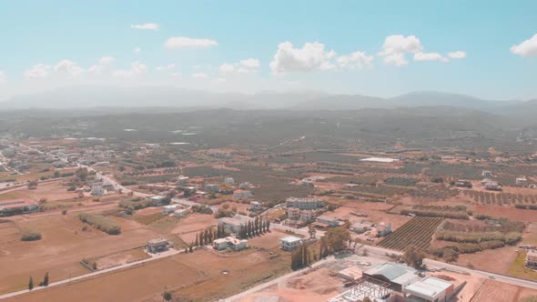 Drone panning over Greek city. alt
