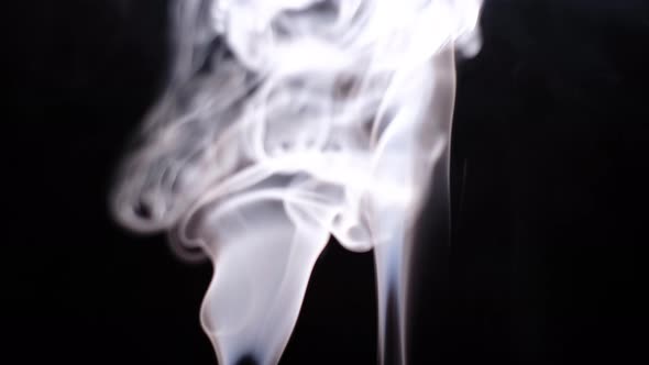 Abstract white smoke isolated on black background, Close up.