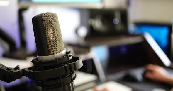 A high quality condenser microphone for a podcast in a music recording studio or livestream radio st alt