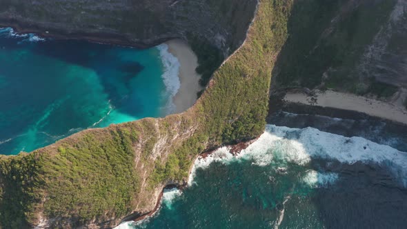 Cliff Along the Nuda Penida Island and Strong Waves Crashing on the Shore alt