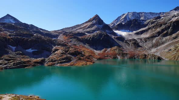 Stunning View Of The Weiss See In The Alpine Mountains In High Tauern National Park In Austria. aeri alt
