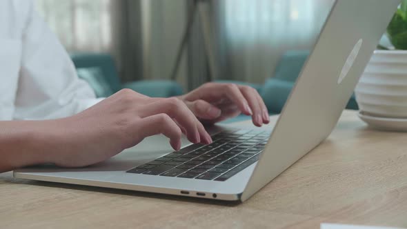 Close Up Of Hand's Man Student Typing On Computer At Home alt