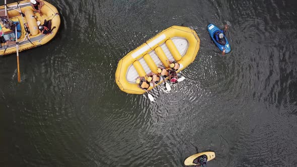Yellow rafting boat capsizing at Jinja on the Nile River in Uganda. Drone top view. 4k alt