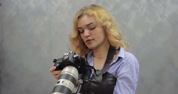 Photographer Make Shooting in a Photo Studio