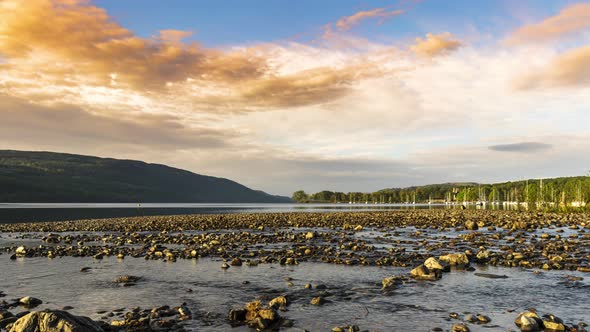 Sunrise Over a Lake Shoreline