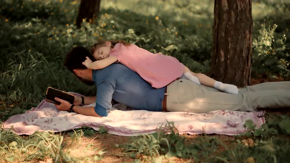 Girl Laying On Father Back.Single Parent Dad Teach Adorable Cute Preschool Child Girl. Family. alt