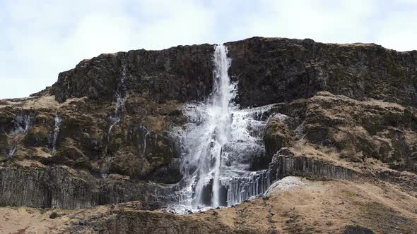 Frozen high fall of Iceland, huge majestic nature 4k