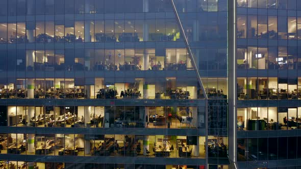 Closeup of the Night Office Windows of a Skyscraper alt