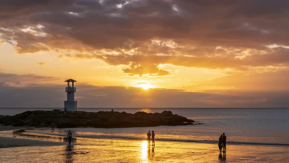 Khao Lak beach with lighthouse, Phang-Nga, Thailand; day to night - Time Lapse