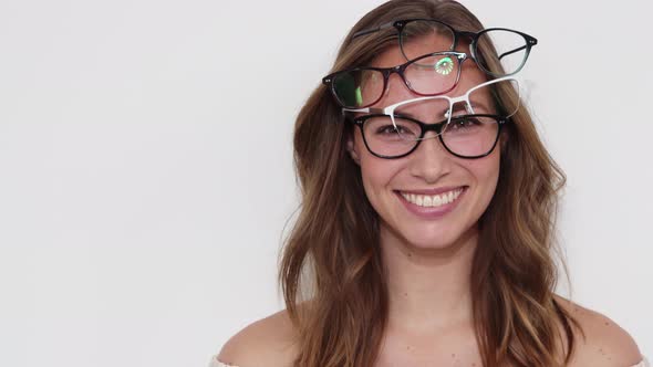 Woman Wearing All Four Glasses at the Same Time
