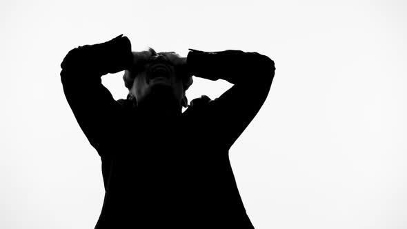 Man Silhouette Shouting in Pain After Loss of Wife, Becomes Insane Schizophrenia alt