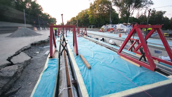 Tram Rails at the Stage of Their Installation and Integration Into Concrete Plates on the Road alt