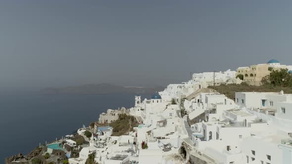 Aerial view of traditional houses on Santorini island, Imerovigli, Greece. alt
