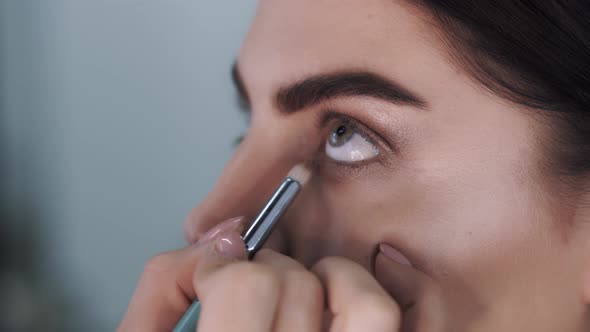 Beautiful Cute Young Caucasian Woman at a Makeup Artists Cabinet alt