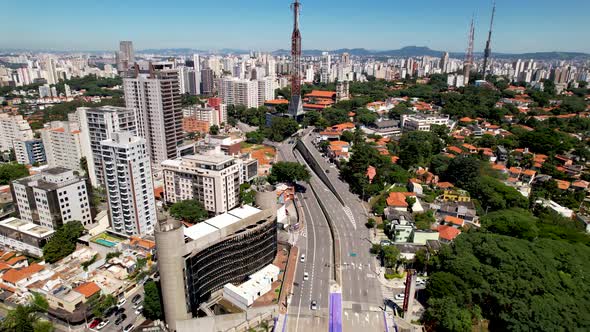 Panning winde of colorful Sumare Bridge at downtown Sao Paulo Brazil. alt
