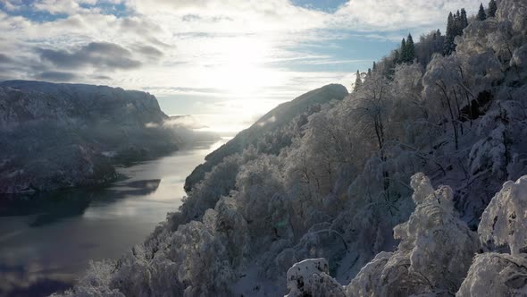 Fairytale magical snow hill Norwegian fjord Veafjorden Europe winter alt