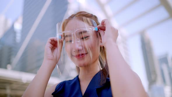 Office Girl in the city (Bangkok), wearing face shield