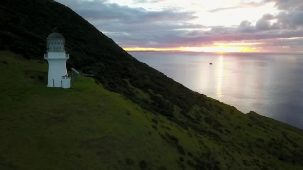 Brett lighthouse in New Zealand during sunset alt