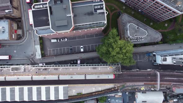 Drone Static Shot of a Top View of the Putney Bridge Station Platform alt