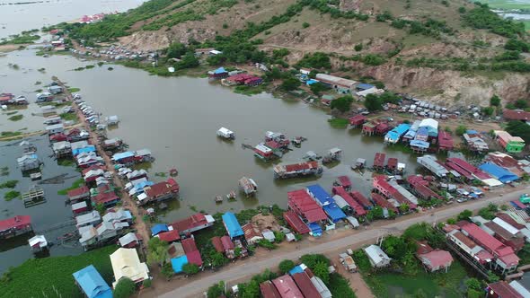 Farming and fishing village near Siem Reap in Cambodia seen from the sky alt