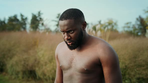 Naked Sportsman Standing in Park. Muscular an Posing at Camera Outdoors alt