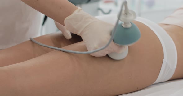 Hardware Figure Correction. Machine Cosmetology. Beautiful Woman Having Cavitation, Procedure alt