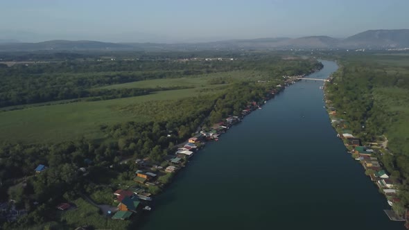 Floating Restaurants and Guesthouses Located on the River Bank