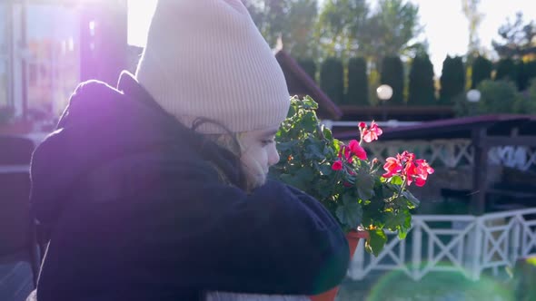 Girl Staying on a Autumn Terrace alt